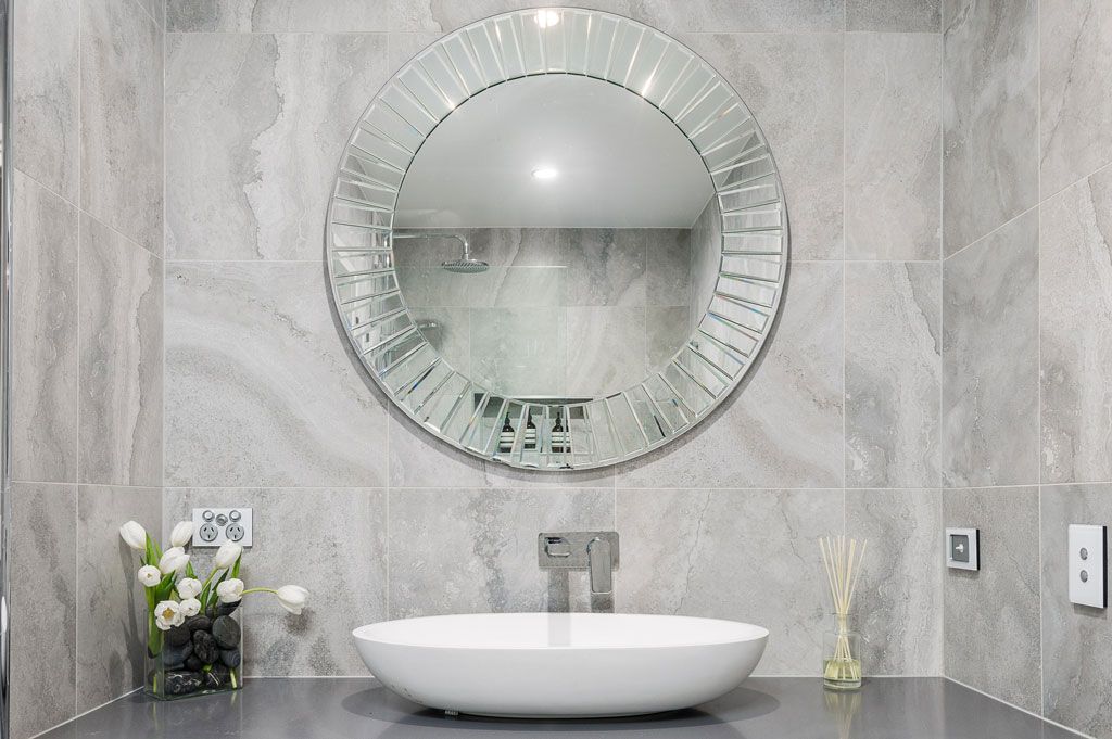 Brisbane Bathroom Company Modern vanity with oval shaped porcelain vanity basin and art deco vanity mirror located in Bardon